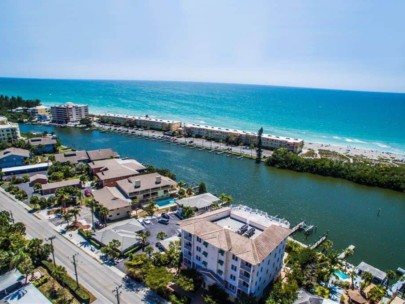 Cozy Cove Condos in Siesta Key, FL. - Pool and Waterfront Aerial