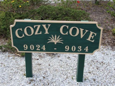 Cozy Cove Condos in Siesta Key, FL. - Sign