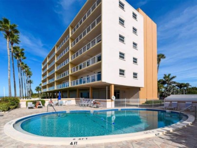 Longboat Beachcomber Condos in Longboat Key, FL. - Building and Pool