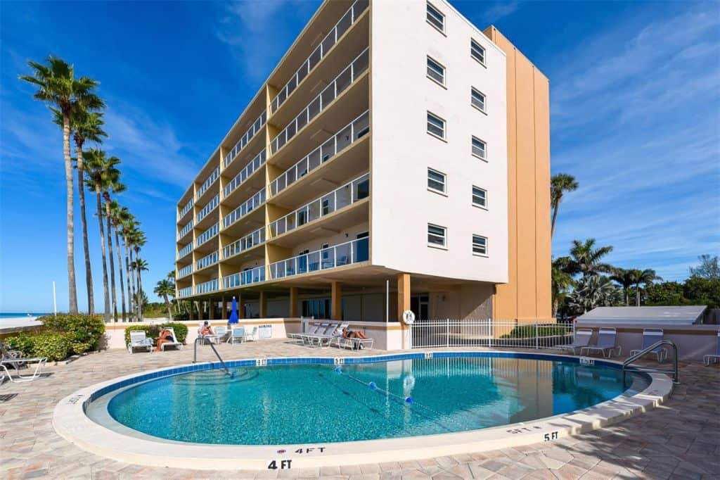 Longboat Beachcomber Condos in Longboat Key, FL. - Building and Pool