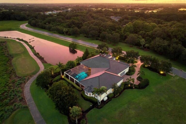 Sarasota FL. Golf Course Homes - Dusk Aerial View of Home on Golf Course