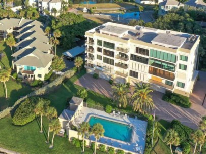 Windward Passage Condos in Siesta Key, FL. - Pool Aerial