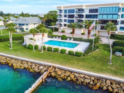 Windward Passage Condos in Siesta Key, FL. - Waterfront Pool Aerial