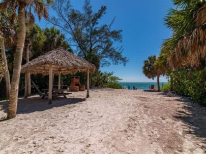 Cocoanut Bayou Homes in Siesta Key, FL. - Private Beach Access Tiki Hut