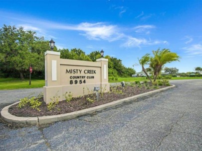 Misty Creek Homes in Sarasota, FL. - Country Club Entrance Sign