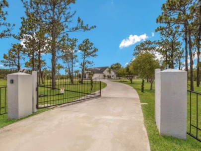 Panther Ridge Homes in Bradenton, FL. - Gated Entrance to Farmhouse