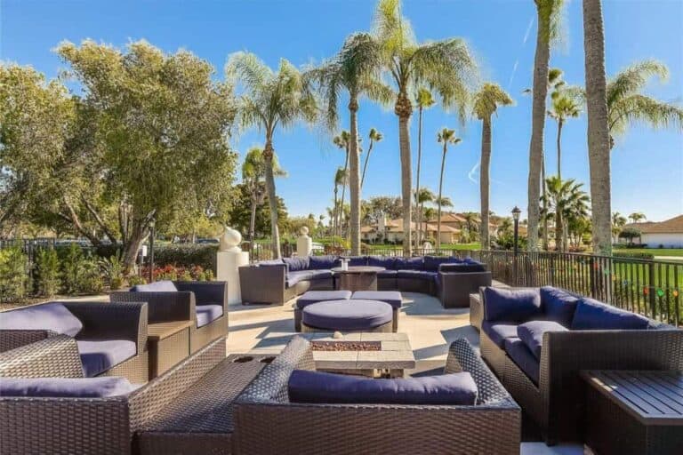Peridia Homes in Bradenton, FL. - Clubhouse Patio and Fire Table