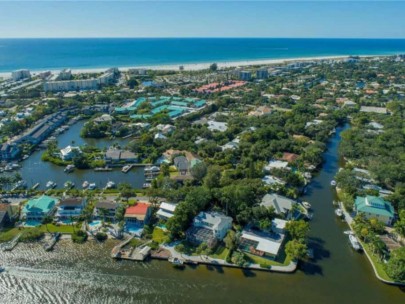 Royal Palm Harbor Homes in Siesta Key, FL. - Aerial with Water