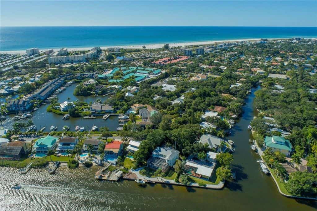 Royal Palm Harbor Homes in Siesta Key, FL. - Aerial with Water