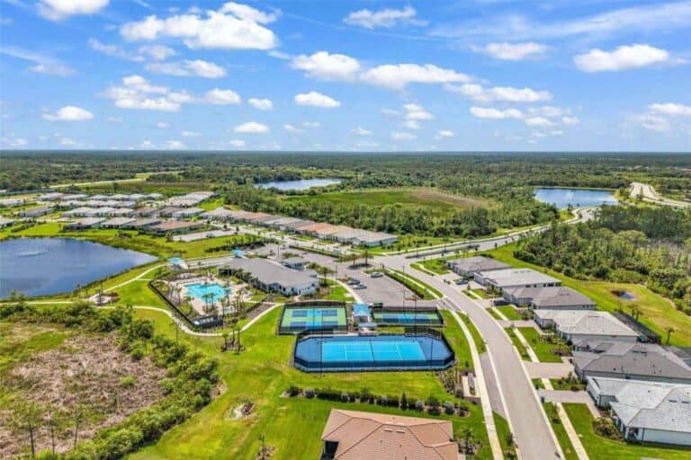Aerial view of residential areas and amenities at Arbor Oaks in North Port, Florida.