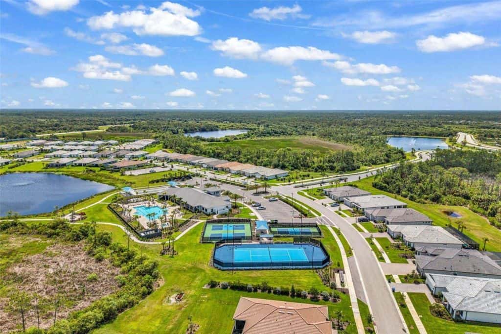Aerial view of residential areas and amenities at Arbor Oaks in North Port, Florida.